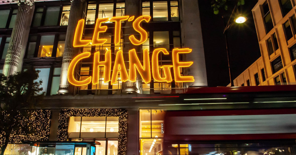 big vibrant let's change neon sign