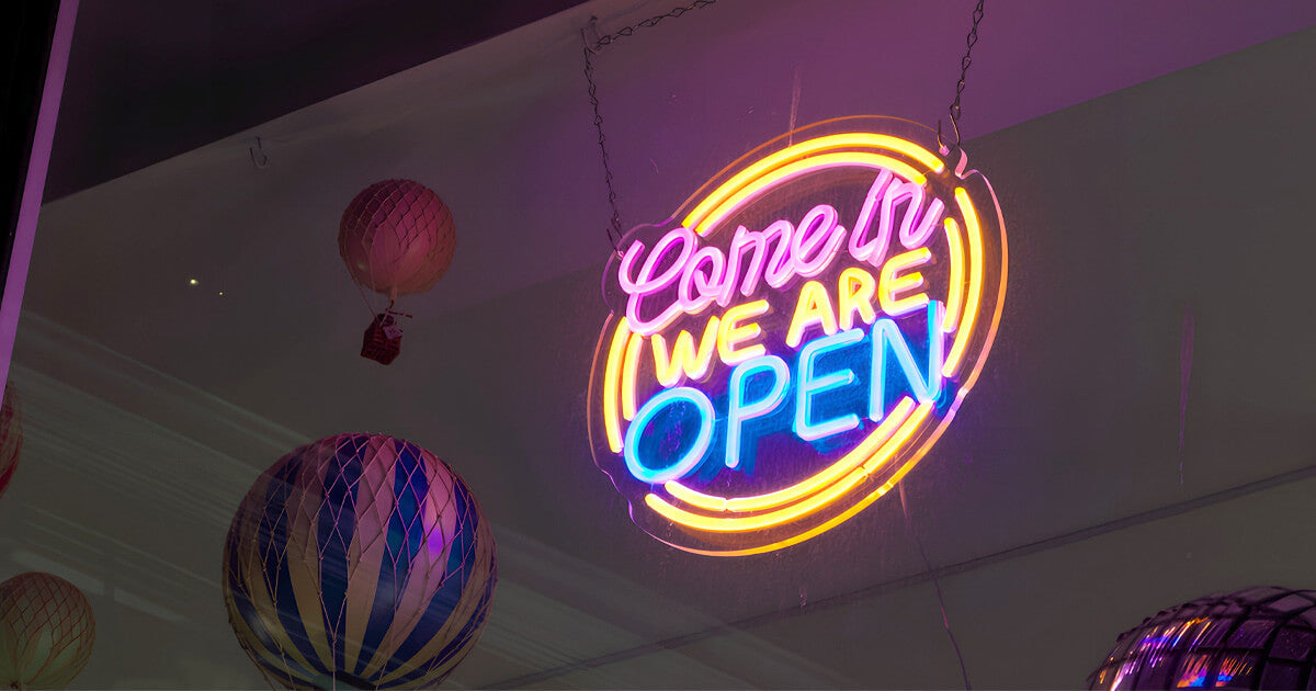 we are open neon sign in shop