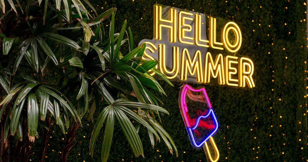 mounted neon sign on a wall